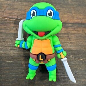 Green and Blue Ninja Turtle Action Figure